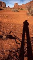 schaduw van de fotograaf in Monument Valley foto