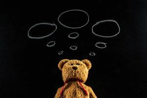 teddybeer met schoolbord, achtergrond foto