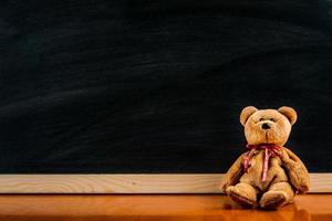 teddybeer met schoolbord, achtergrond foto