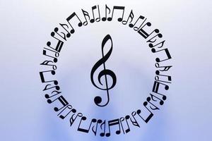 muzieknoten en symbolen met bochten en wervelingen op een witte achtergrond. 3d illustratie foto