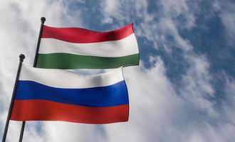 vlaggen van hongarije en rusland. blauwe lucht en vlag hongarije en rusland, 3d werk en 3d beeld foto