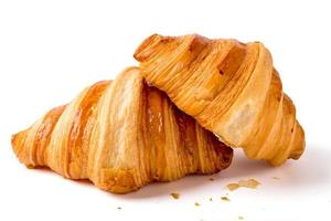 2 croissants geïsoleerd op een witte achtergrond. ontbijt, snacks of bakkerij. foto