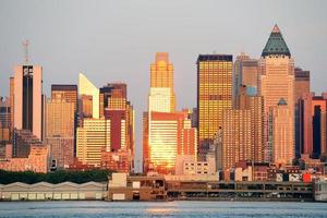 New York City Manhattan bij zonsondergang over Hudson River foto