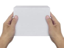 doos in de hand op witte achtergrond isolatie foto