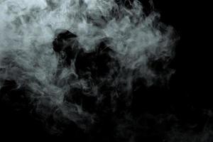 abstracte poeder of rook geïsoleerd op zwarte achtergrond foto