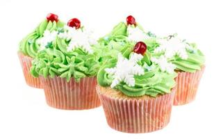 studio geïsoleerde romige groene cupcake foto