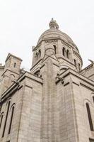 de externe architectuur van sacre coeur, montmartre, parijs, frankrijk foto