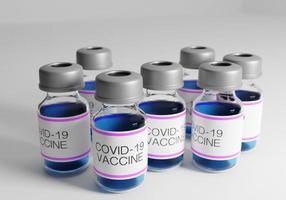 3D-weergave van covid-19-vaccinflessen foto