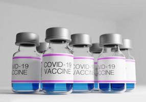 3D-weergave van covid-19-vaccinflessen foto