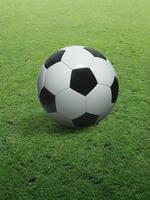 close-up voetbal op groen gras foto