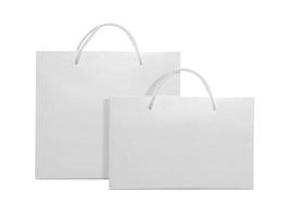 Witte lege papieren zak geïsoleerd op een witte achtergrond voor design foto