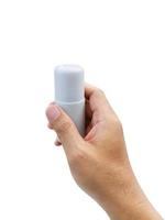 mannelijke handen met roll-on deodorant voor oksels op een witte achtergrond foto