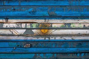 de nationale vlag van Argentinië is geschilderd op ongelijke planken. land symbool. foto