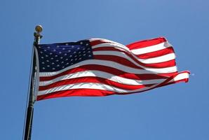 Amerikaanse vlag wappert in de wind foto