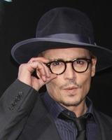 los angeles, 12 feb - johnny depp op de 3 days to kill la première in arclight hollywood theaters op 12 februari 2014 in los angeles, ca foto