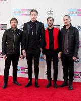 Los Angeles, 24 nov - Imagine Dragons bij de aankomst van de American Music Awards 2013 in Nokia Theatre op 24 november 2013 in Los Angeles, ca. foto