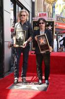 los angeles, 2 sep - daryl hall, john oates in de hal en oates hollywood walk of fame ster ceremonie op hollywood boulevard op 2 september 2016 in los angeles, ca foto