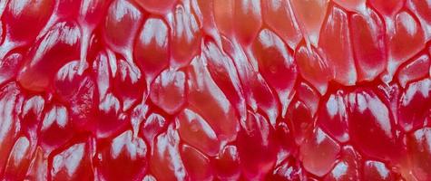 macro-opname van rode pomelo pulp textuur achtergrond. thailand siam ruby pomelo fruit. natuurlijke bron van vitamine C-antioxidanten en kalium. gezonde voeding om veroudering te vertragen foto