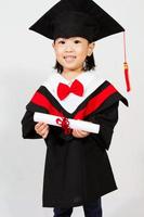Aziatische kind afstuderen foto