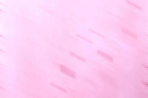 abstracte roze achtergrondkleur met bewegingsonscherpte foto