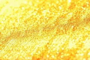 gouden glitter bokeh verlichting textuur wazig abstracte achtergrond voor verjaardag, jubileum, bruiloft, oudejaarsavond of kerst foto