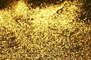 gouden glitter bokeh verlichting textuur wazig abstracte achtergrond voor verjaardag, jubileum, bruiloft, oudejaarsavond of kerst foto