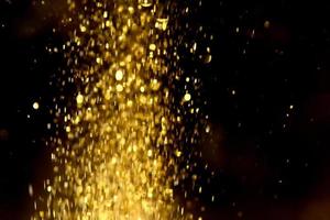 gouden glitter bokeh verlichting textuur wazig abstracte achtergrond voor verjaardag, jubileum, bruiloft, oudejaarsavond of kerst foto