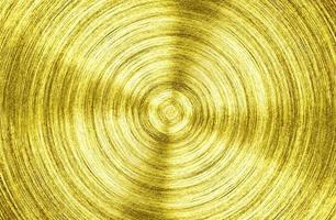 een metalen gouden ijzer met cirkelvormige textuurachtergrond foto