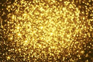 gouden glitter bokeh verlichting textuur wazig abstracte achtergrond voor verjaardag, jubileum, bruiloft, oudejaarsavond of kerst foto