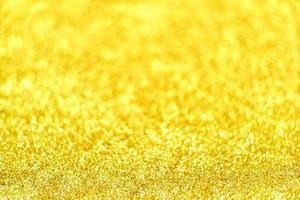 gouden glitter bokeh verlichting textuur wazig abstracte achtergrond voor verjaardag, jubileum, bruiloft, oudejaarsavond of kerst foto