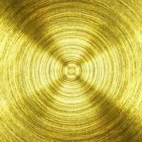 een metalen gouden ijzer met cirkelvormige textuurachtergrond foto