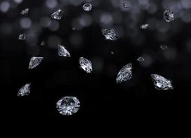 vallende 3d diamanten op zwarte achtergrond foto