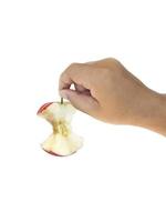 hand met de appel op een witte achtergrond foto