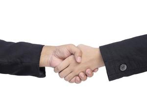 close-up volwassen en jonge zakenlieden schudden handen op geïsoleerde witte achtergrond foto
