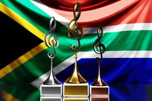 treble clef awards voor het winnen van de muziekprijs tegen de achtergrond van de nationale vlag van zuid-afrika, 3d illustratie. foto
