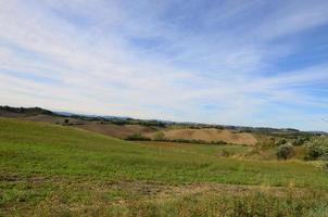 glooiende heuvels van toscane italië foto