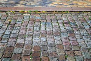 gedetailleerde close-up op oude historische geplaveide wegen en voetpaden foto