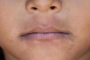 close-up van roze lippen van een baby foto