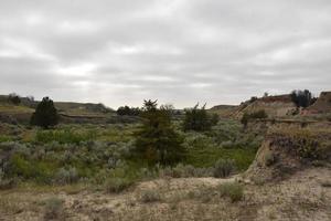 badlands-achtergrond in de schilderachtige buitenlucht van Zuid-Dakota foto