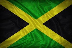 Jamaica vlag patroon op de structuur van het weefsel, vintage stijl foto