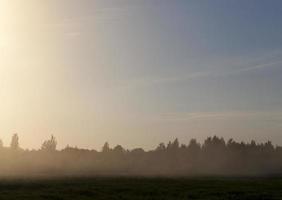 landschap met zonsondergang foto