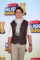 los angeles, 27 april - zach callison arriveert bij de radio disney music awards 2013 in het nokia theater op 27 april 2013 in los angeles, ca foto