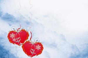 kerstkaart voor valentijnsdag. hart in de sneeuw foto