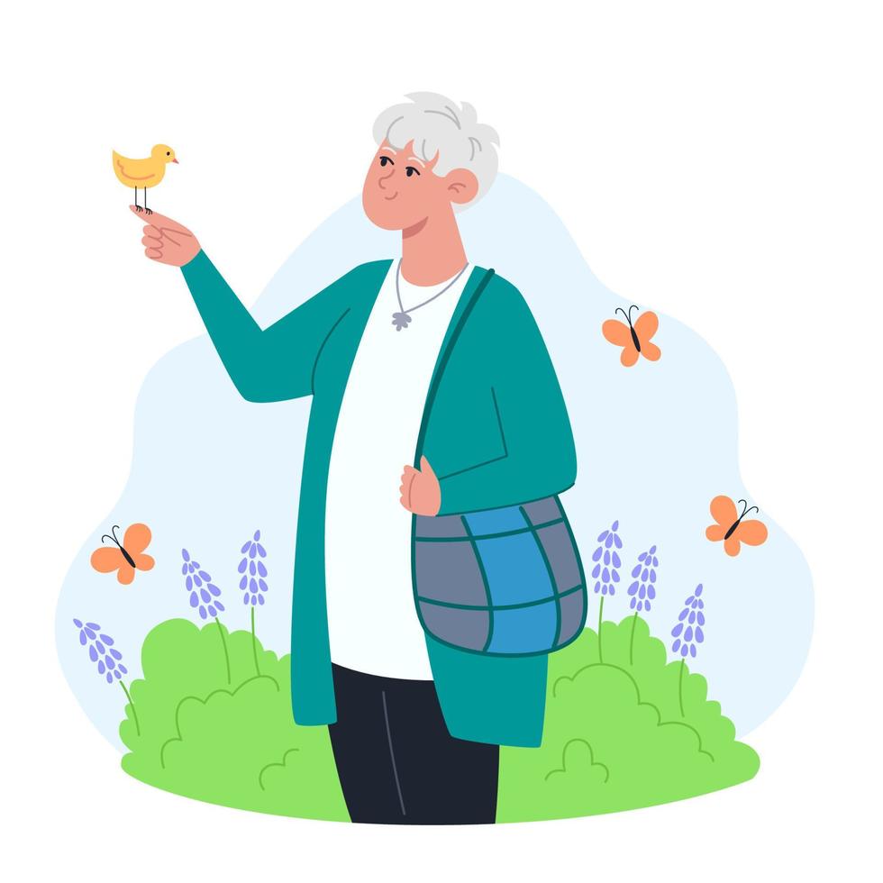 Senior vrouw staat in de tuin en houdt een vogel in haar hand Vrouw staat in de tuin en houdt een vogel in haar hand vector