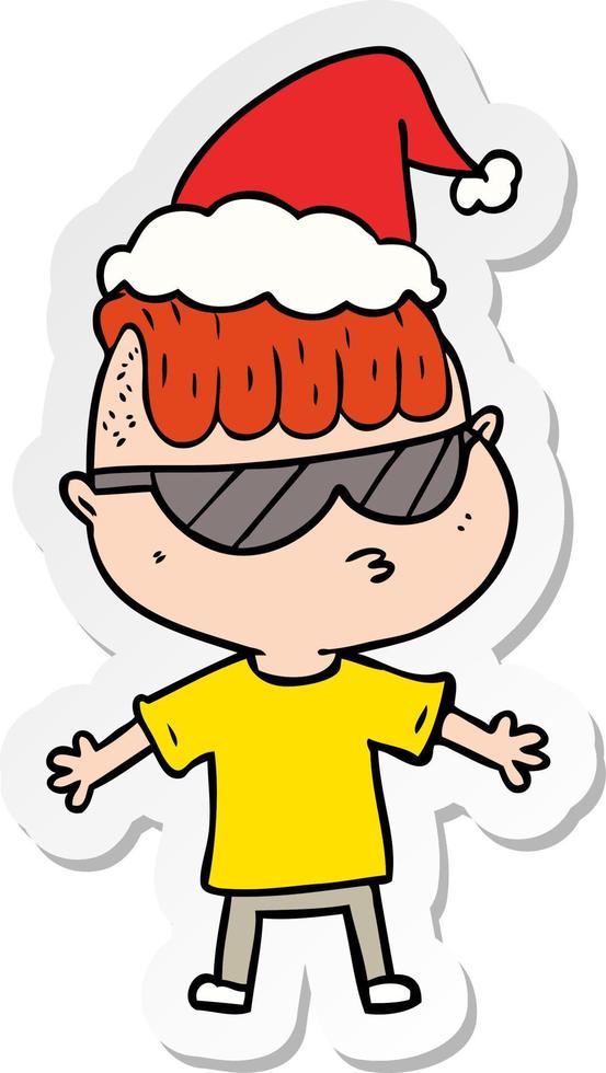 sticker cartoon van een jongen die een zonnebril draagt met een kerstmuts vector