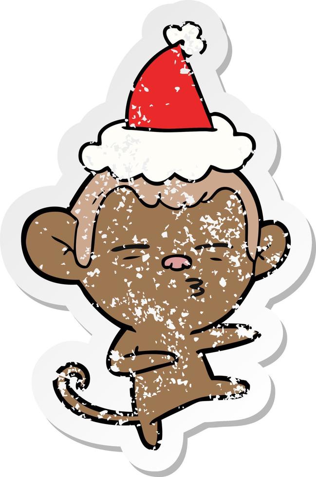 verontruste sticker cartoon van een verdachte aap met een kerstmuts vector
