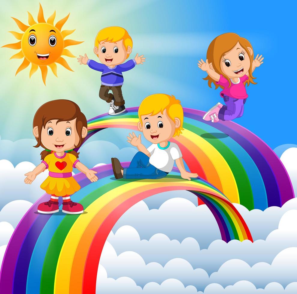 gelukkige kinderen die over de regenboog staan vector