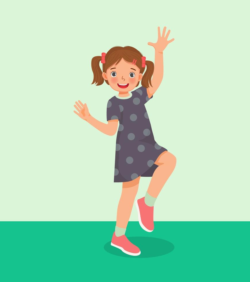 schattig klein meisje dansen met plezier in de studio vector