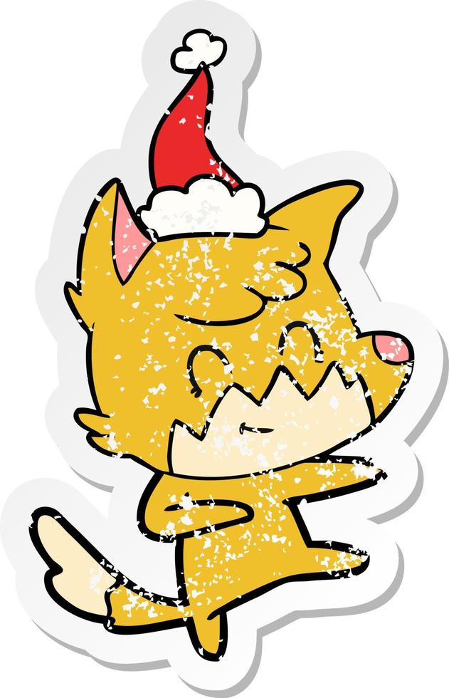 verontruste sticker cartoon van een vriendelijke vos met een kerstmuts vector