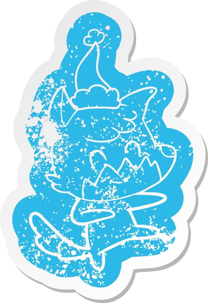 cartoon noodlijdende sticker van een vriendelijke vos met een kerstmuts vector